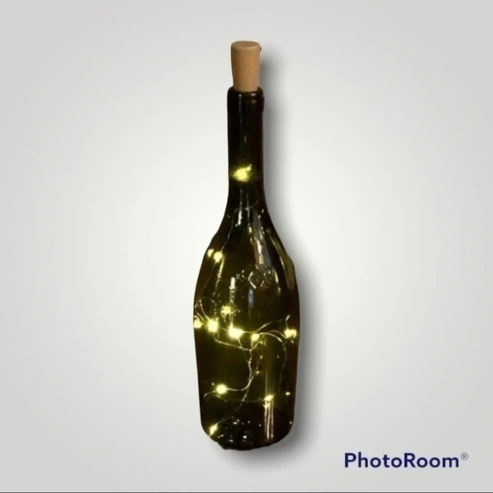 Fairy lights in wine bottle